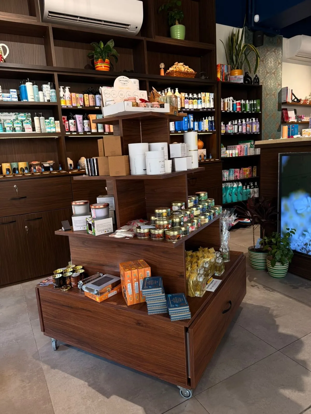 Shelves of wellness products at AromaHub